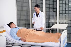 doctor visits patient who is in bed giving an idea of ​​patient comfort